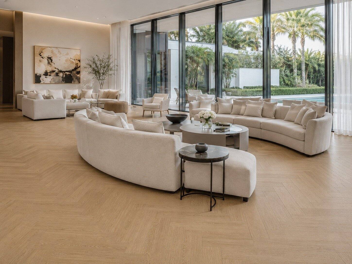 Light oak herringbone in a serene curved-sofa living room